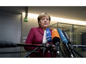 German Chancellor Angela Merkel talks about the decision by British lawmakers to oppose the agreement negotiated by British Prime Minister Theresa May and the EU, during a statement at a parliament building in Berlin, Jan. 16, 2019.