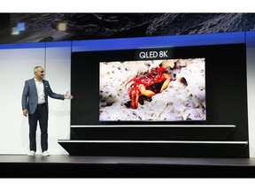 Dave Das, senior vice president, Samsung Electronics America, unveils the 98" QLED 8K TV during a Samsung news conference at CES International, Monday, Jan. 7, 2019, in Las Vegas.