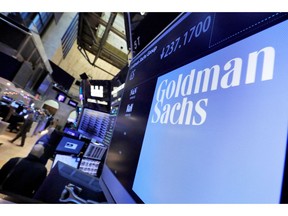 FILE - In this Dec. 13, 2016, file photo, the logo for Goldman Sachs appears above a trading post on the floor of the New York Stock Exchange. The Goldman Sachs Group Inc. reports financial results Wednesday, Jan. 16, 2019.