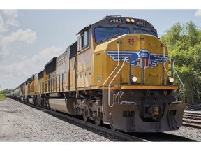 FILE- In this July 31, 2018, file photo a Union Pacific train travels through Union, Neb. Union Pacific Corp. reports financial results Thursday, Jan. 24, 2019.