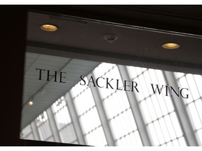A sign with the Sackler name is displayed at the Metropolitan Museum of Art in New York, Thursday, Jan. 17, 2019. The Sackler name adorns walls at some of the world's top museums and universities, including the Met, the Guggenheim and Harvard. But the family's ties to the powerful painkiller OxyContin and the drug's role in the nation's deadly opioid crisis are bringing a new kind of attention to the Sacklers and their philanthropic legacy.