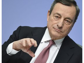 President of European Central Bank Mario Draghi talks to the media during a press conference following the meeting of the ECB governing council in Frankfurt, Germany,Thursday, Jan.24, 2019.
