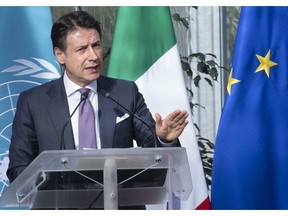 Italian Premier Giuseppe Conte delivers his speech during the inauguration ceremony of the ACSD (Africa Center for Climate and Sustainable Development) in Rome, Monday, Jan. 28, 2019.