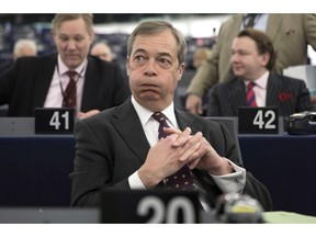 Former U.K. Independence Party (UKIP) leader Nigel Farage listens at the European Parliament during a debate on Brexit, Wednesday, Jan.16, 2019 in Strasbourg, eastern France. European Union Brexit negotiator Michel Barnier says the bloc is stepping up preparations for a chaotic no-deal departure of Britain from the bloc after the rejection of the draft withdrawal deal in London left the EU "fearing more than ever that there is a risk" of a cliff-edge departure.