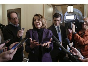 In this Jan, 18, 2019, photo, Speaker of the House Nancy Pelosi, D-Calif., takes questions from reporters on Capitol Hill in Washington.