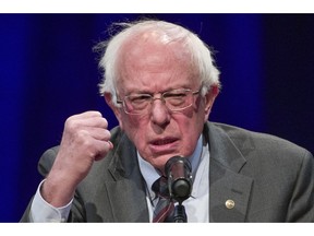 FILE - In this Nov. 27, 2018, file photo, Sen. Bernie Sanders, I-Vt., speaks about his new book at a George Washington University/Politics and Prose event in Washington. Leading congressional liberals are unveiling a package of bills that aims to reduce what Americans pay for prescription drugs by linking prices to lower costs in other countries. Sanders and Maryland Democratic Rep. Elijah Cummings plan to introduce three bills Thursday, Jan. 10, 2019.