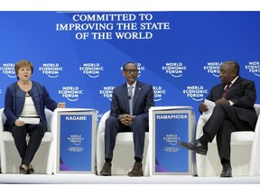 Kristalina Georgieva, CEO of the World Bank, Paul Kagame, President of Rwanda, and Cyril Ramaphosa, President of South Africa, from left, participate in a session at the annual meeting of the World Economic Forum in Davos, Switzerland, Thursday, Jan. 24, 2019.