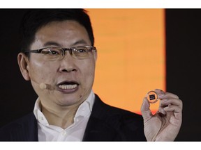 Richard Yu, CEO of Huawei Consumer Business Group, speaks as he unveils the 5G modem Balong 5000 chipset in Beijing, Thursday, Jan. 24, 2019. Chinese tech giant Huawei has announced plans to release a next-generation smartphone based on its own technology instead of U.S. components, stepping up efforts to compete with global industry leaders.