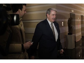 U.S. Undersecretary for Trade and Foreign Agricultural Affairs Ted McKinney is chased by journalists as he walks into a hotel after a second day of meetings with Chinese officials in Beijing, Tuesday, Jan. 8, 2019. An official Chinese newspaper warned Washington not to demand too much from Beijing as talks on ending their tariff war wound up a second day Tuesday with no word on possible progress.