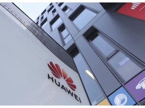 The Huawei logo displayed at the main office of Chinese tech giant Huawei in Warsaw, Poland, on Friday, Jan. 11, 2019. Poland's Internal Security Agency has charged a Chinese manager at Huawei in Poland and one of its own former officers with espionage against Poland on behalf of China.