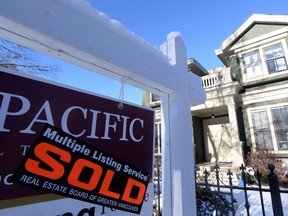 The debt-to-income ratio was 208 per cent for residents of Toronto and 242 per cent for Vancouverites, according to CMHC.