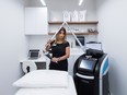 Medical esthetician Amra Nizar, who works for the Beauty Clinic by Shoppers Drug Mart, gives a demonstration using the picosure laser skin treatment which addresses a variety of skin concerns and is suitable for all skin types at the clinic in Oakville, Ont.