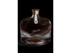 Three of the top selling lots of 2018 at Acker Merrall & Condit: 1999 H. Jayer Vosne Romanee Cros Parantoux (sold USD$153,600); incredibly rare 1863 Niepoort in Lalique Vintage Port (sold USD$128,000); and 1999 DRC Romanee Conti (sold USD$124,000)
