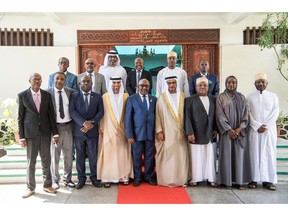Comoros President in commemorative photo with UAE delegation
