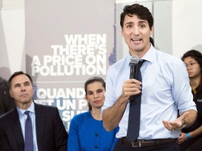 Prime Minister Justin Trudeau speaks to the media and students at Humber College regarding his government's new federally-imposed carbon tax in Toronto on Tuesday, Oct. 23, 2018.