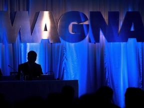 The Magna International Inc. logo is seen prior to the company's annual general meeting to begin in Toronto on Friday, May 10, 2013.