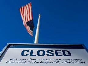 A sign is displayed on a government building that is closed because of the record-long U.S. government shutdown, in Washington, D.C.