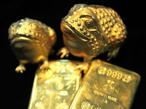 Gold bars and toads on display at a jewellery shop in Seoul.