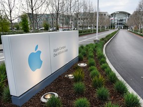 The entrance of Apple Inc. headquarters in Cupertino, California. Apple's senior director of corporate law has been charged with insider trading.