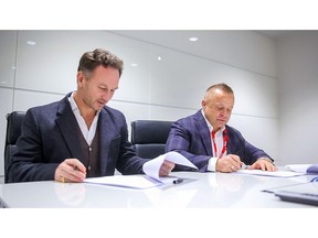 FuturoCoin unveiled as partner of Aston Martin Red Bull Racing - L to R - Christian Horner Red Bull Racing Team Principal and Roman Ziemian Co-Founder of FuturoCoin