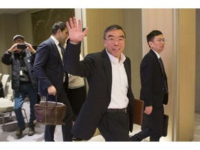 Liang Hua, Chairman of Huawei's Board of Directors, leaves a media roundtable event in Toronto, on Thursday, February 21, 2019.