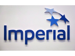 The Imperial Oil logo is shown at the company's annual meeting in Calgary, Friday, April 28, 2017. Imperial Oil Ltd. reported a fourth-quarter profit of $853 million compared with a loss of $137 million in the same quarter a year earlier.THE CANADIAN PRESS/Jeff McIntosh