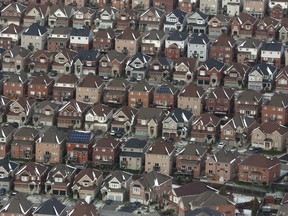 Aerial view of houses in Oshawa, Ont.. The Canadian Real Estate Association says last month was the weakest January for residential sales since 2015, with the number of transactions down four per cent nationally from last year.