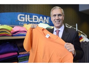 Gildan Activewear Inc. president and CEO Glenn Chamandy poses for a photograph following the apparel manufacturer's annual meeting Thursday, February 5, 2015 in Montreal. Gildan Activewear Inc. says strong sales propelled a leap in profits last quarter. The Montreal-based clothing manufacturer, which keeps its books in U.S. dollars, saw fourth-quarter sales jump 13.6 per cent to $742.7 million compared with $653.7 million a year ago.