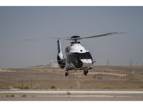 In this photo taken June 26, 2018, an Airbus H160 helicopter perform tests over the Four Corners Regional Airport in Farmington, N.M. The Federal Court of Appeal has upheld a lower court order that Airbus' helicopter division pay Bell Helicopter Textron Inc.'s Quebec-based subsidiary $1 million in punitive damages for a patent violation.