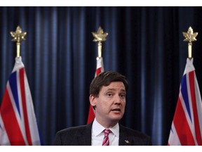 B.C. Attorney General David Eby answers questions from media during a press conference at the Legislature in Victoria, B.C., on Tuesday February 6, 2018.