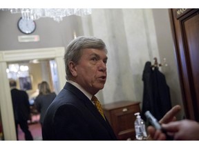 Rep. Roy Blunt, R-Mo., speaks to reporters as he walks into a meeting with Republican Senate leadership at the offices of Senate Majority Leader Mitch McConnell of Ky. on Capitol Hill, Monday, Feb. 11, 2019, in Washington.