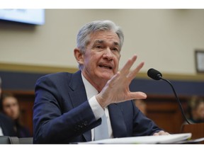 Federal Reserve Board Chair Jerome Powell gestures while speaking before the House Committee on Financial Services hearing on Capitol Hill in Washington, Wednesday, Feb. 27, 2019.