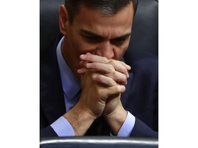 FILE - In this Wednesday, Feb. 13, 2019 file photo, Spain's Prime Minister Pedro Sanchez at the Spanish parliament in Madrid. Sanchez is under pressure to call an early election with an announcement expected Friday Feb. 15, 2019, putting Spain on the path to its third general election in less than four years.