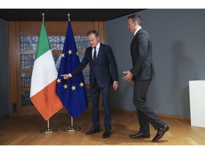 Irish Prime Minister Leo Varadkar, right, is welcomed by European Council President Donald Tusk before their talks at the Europa building in Brussels, Wednesday, Feb. 6, 2019.