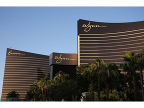 FILE - This June 17, 2014 file photo shows the Wynn Las Vegas and Encore resorts in Las Vegas, both owned and operated by Wynn Resorts. Nevada gambling regulators are due to sanction casino mogul Steve Wynn's former company for failing to investigate claims of sexual misconduct made against him before he resigned a year ago. A fine against Wynn Resorts Ltd. could amount to millions of dollars when the state Gaming Commission takes final action Tuesday, Feb. 26, 2019, to end a year-long investigation.