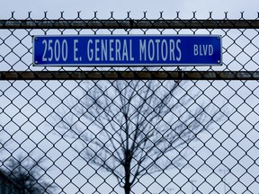 A road sign outside General Motors' Detroit-Hamtramck assembly plant in Detroit, Mich.