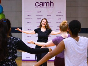 Wellness Centre fitness instructor Gabriela Carnovale leads a class for staff at CAMH.