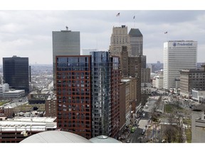 FILE - This April 10, 2018, file photo shows part of the skyline in Newark, N.J. Officials in Newark, which was one of the 18 finalists that Amazon rejected in November when it announced it would split its HQ2 between New York and northern Virginia, sent a giant heart that said "NJ & Newark Still Love U, Amazon!" The love note came despite Amazon saying it's not seeking a new site.