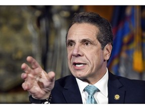 FILE - In this Feb. 11, 2019 file photo, New York Gov. Andrew Cuomo talks about his upcoming meeting with President Donald Trump during a news conference in the Red Room at the state Capitol in Albany, N.Y.  Cuomo says Amazon's backing out of a deal to put one of its second headquarters in New York City is the "greatest tragedy" he has seen since he's been in government. Cuomo said Friday, Feb. 22  on public radio station WAMC that losing the Amazon deal makes him sick to his stomach.