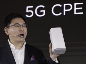 Richard Yu, CEO of the Huawei consumer business group speaks as he unveils the wireless router running with 5G modem Balong 5000 chipset in Beijing last month. Security experts say the U.S. government is likely exaggerating the threat it says the Chinese telecommunications giant Huawei poses to the world's next-generation wireless networks.