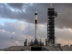 In this Jan. 3, 2019 photo provided by SpaceX, the SpaceX Falcon 9 rocket and Crew Dragon spacecraft is rolled out to Launch Complex 39A for a dry run to prep for the upcoming Demo-1 flight test at NASA's Kennedy Space Center in Florida.  SpaceX rockets closer to human spaceflight with this weekend's debut of a new capsule designed for astronauts. The six-day test flight will be real in every regard, beginning with a Florida liftoff Saturday, March 2 and a docking the next day with the International Space Station. But the Dragon capsule won't carry humans, rather a test dummy in the same white SpaceX spacesuit that astronauts will wear.  (SpaceX via AP)