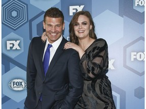 FILE - In this May 16, 2016 file photo, David Boreanaz and Emily Deschanel attend the FOX Networks 2016 Upfront Presentation Party in New York. An arbitrator has ordered 21st Century Fox to pay $179 million in a dispute over profits with the stars of the long-running Fox TV show "Bones." Boreanaz and Deschanel, the stars of "Bones" from 2005 through 2017, sued Fox in 2015, saying it denied them profits by licensing the show to Fox's TV division and to Hulu for below-market rates.
