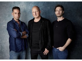 FILE - In this Jan. 24, 2019, file photo, Wade Robson, from left, director Dan Reed and James Safechuck pose for a portrait to promote the film "Leaving Neverland" at the Salesforce Music Lodge during the Sundance Film Festival in Park City, Utah. The Michael Jackson estate has sent a letter to the U.K.'s Channel 4 warning that the documentary on Robson and Safechuck, who accuse the singer of molesting them as boys violates the network's programming guidelines. Estate attorneys say in the letter released to The Associated Press on Monday, Feb. 11, that "Leaving Neverland," includes no response from Jackson defenders as the channel's guidelines require.