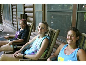 In this summer 2012 photo, camp counselors from left, Molly Sprayregen, Sally Cohen, and Hillary Handler spend time relaxing at Camp Thunderbird in Bemidji, Minn. Overnight camp counselors learn important skills and values that carry over to the workplace and real life.