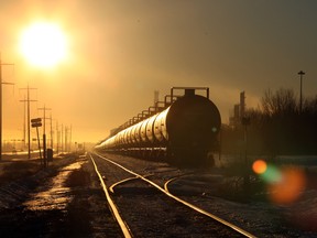 Alberta has reached a deal with Canadian Pacific Railway  and Canadian National Railway  to lease 4,400 rail cars over three years.