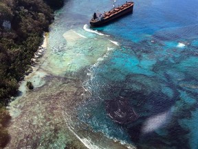 This undated handout provided by the Department of Foreign Affairs and Trade (DFAT) of Australia on March 1, 2019 shows the oil spill from the MV Solomon Trader along the coastline of Rennell Island, some 240 kilometres south of the capital Honiara.