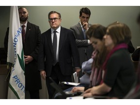 Acting Environmental Protection Agency Administrator Andrew Wheeler walks to a podium a news conference in Philadelphia, Thursday, Feb. 14, 2019. The EPA is expected to announced a plan for dealing with a class of long-lasting chemical contaminants amid complaints from members of Congress and environmentalists that it's not moved aggressively enough to regulate them.