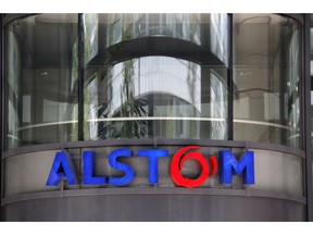 FILE - This Wednesday, April 30, 2014, file photo shows the company logo of Alstom at their headquarters in Levallois-Perret, outside Paris, France. France's finance minister Bruno Le Maire says Wednesday Feb.6, 2019 that EU authorities have decided to reject a merger between France's Alstom and Germany's Siemens railway activities.