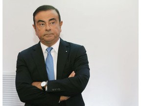 FILE - In this Oct. 6, 2017, file photo, then Renault Group CEO Carlos Ghosn listens during a media conference at La Defense business district, outside Paris. Carmaker Renault has alerted French authorities to a 50,000-euro gift from the chateau of Versailles to its former chairman and CEO Carlos Ghosn, reportedly linked to his lavish wedding there. French newspaper Le Figaro reported that the chateau allowed Ghosn to host his wedding reception on its grounds in exchange for Renault's philanthropic activities to support the Versailles estate, resplendent home to France's last kings.