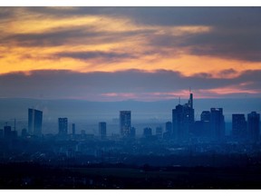 An orange sky is seen over the banking district of Frankfurt, Germany, on Tuesday, Feb. 26, 2019.